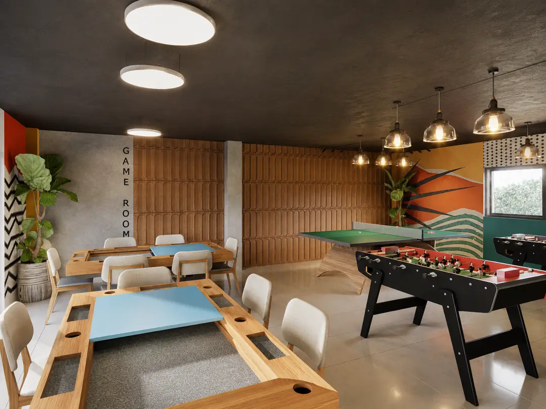 Game Room de Embassy Gardens con mesas de juego para diferentes edades